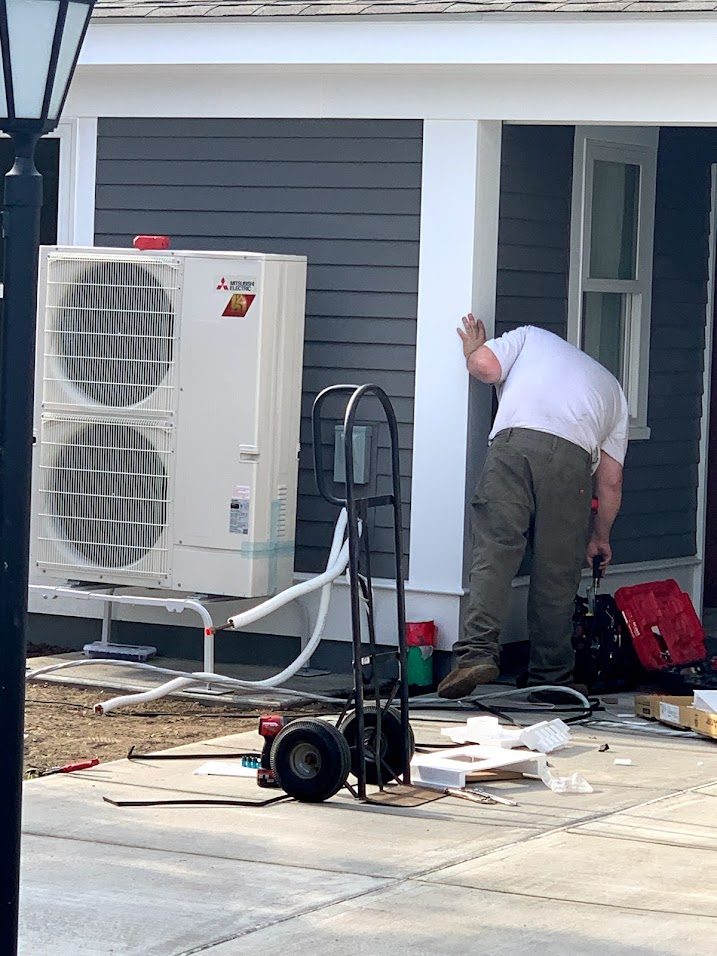 Mitsubishi heat pump installation in progress in Plymouth, MA by Tempacha! Solutions